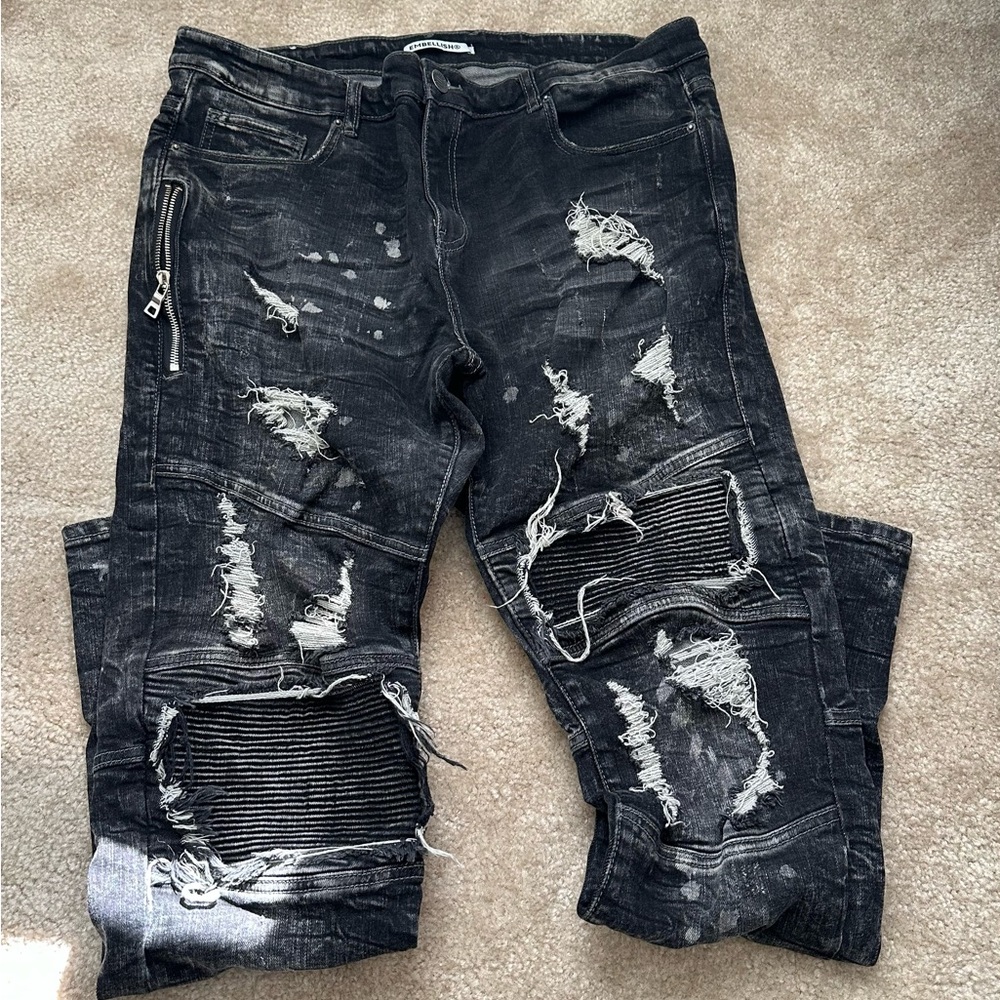 Men’s Embellish ripped jeans.